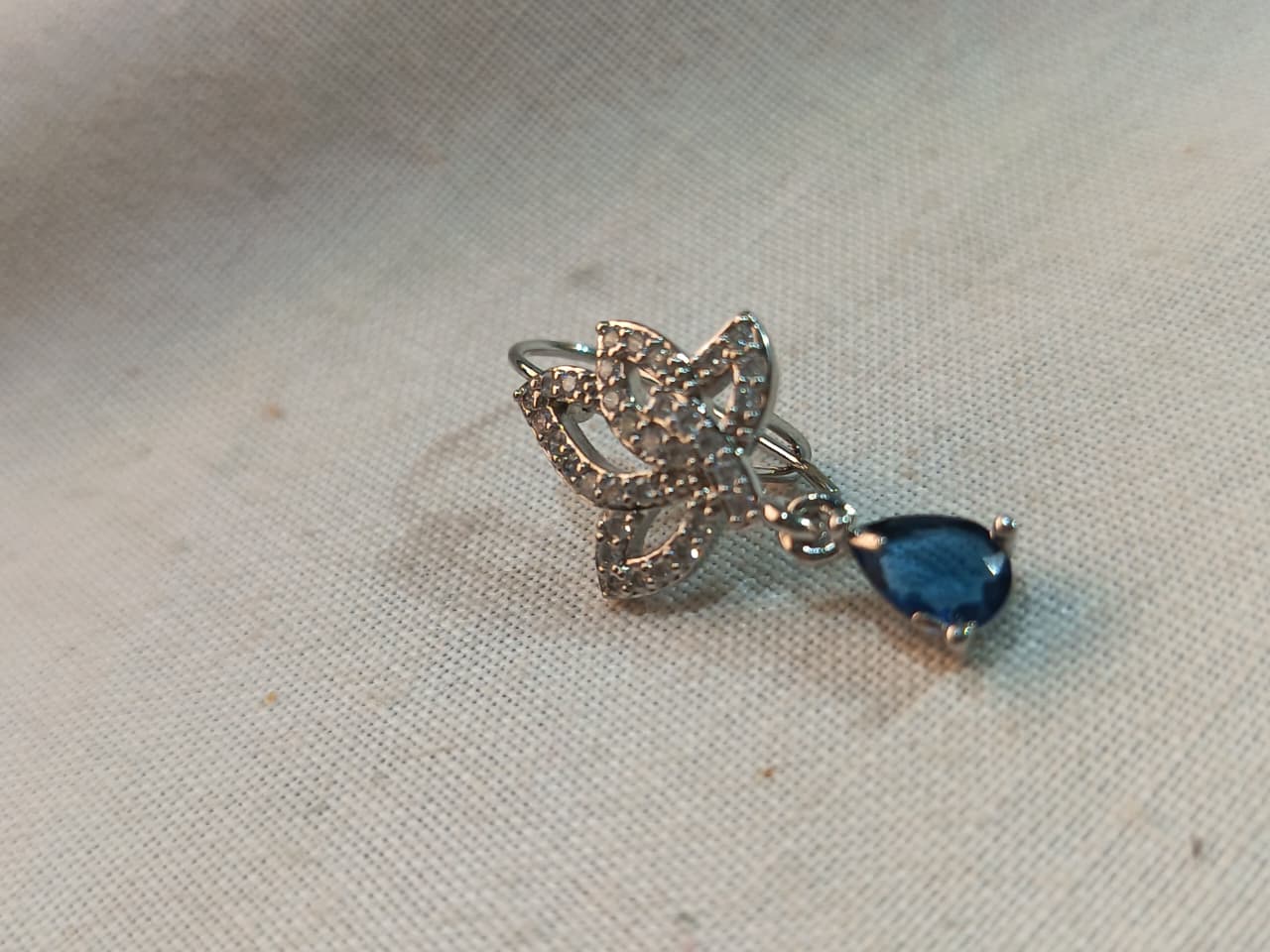 Silver-Plated Floral Ring with Blue Teardrop Gemstone